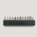 A minimalist flat lay of screwdriver drill bits on a soft neutral background, representing DIY home upgrade essentials and beginner-friendly tools for simple home repairs.